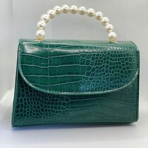 Rub My Pearl Clutch Bag